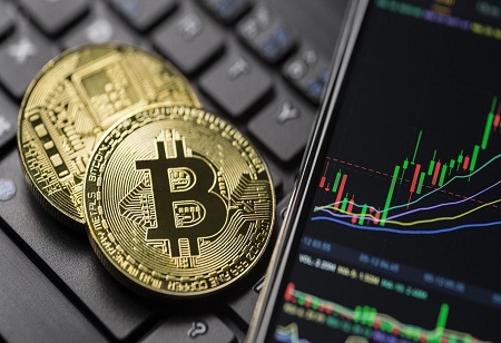 Bitcoin, ether gain marginally while Solana, Cardano slip