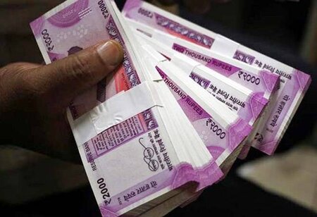 Rupee surges 14 paise to 74.59 against the US dollar in early trade