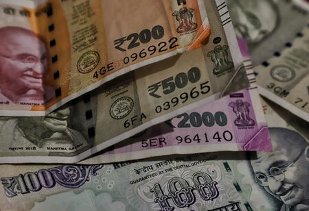 Rupee at all-time low and falls 60 paise to close at 77.50 against US dollars